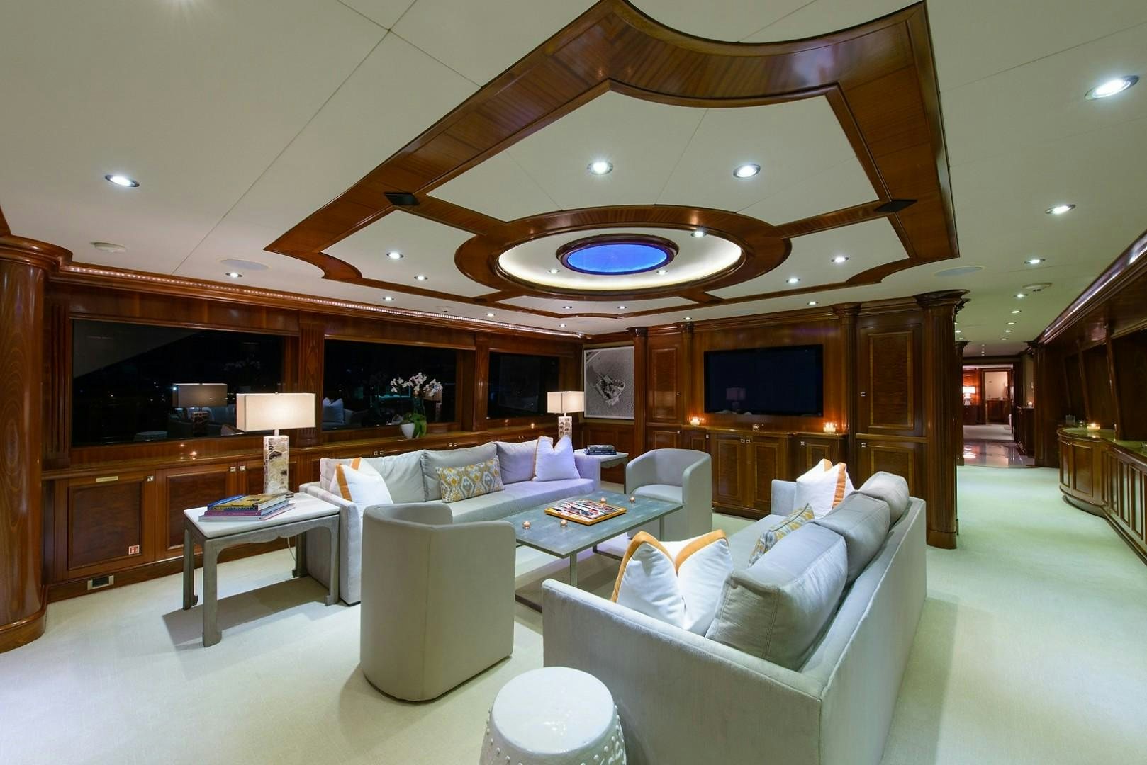 a large living room with a large open floor plan aboard FAR FROM IT Yacht for Charter