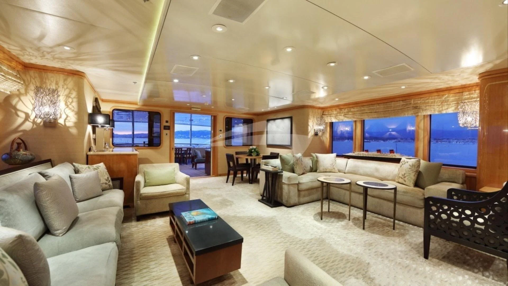 a living room with a large window aboard HELIOS 2 Yacht for Charter