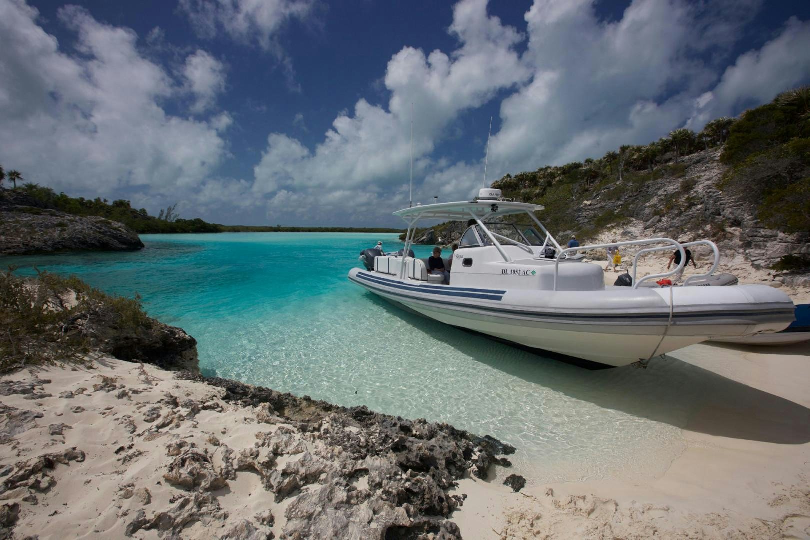 a boat on a beach aboard RENA Yacht for Charter