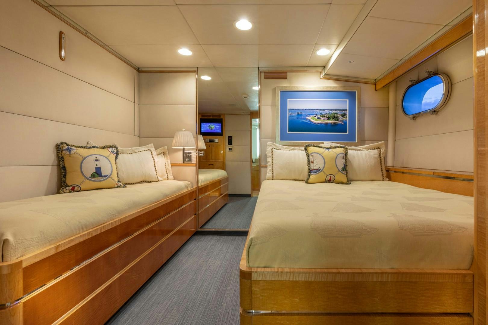 a room with two beds aboard RENA Yacht for Charter