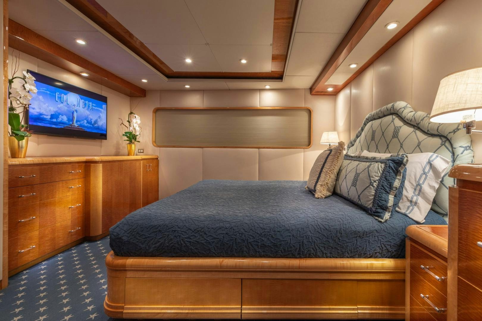 a bed in a room aboard RENA Yacht for Charter