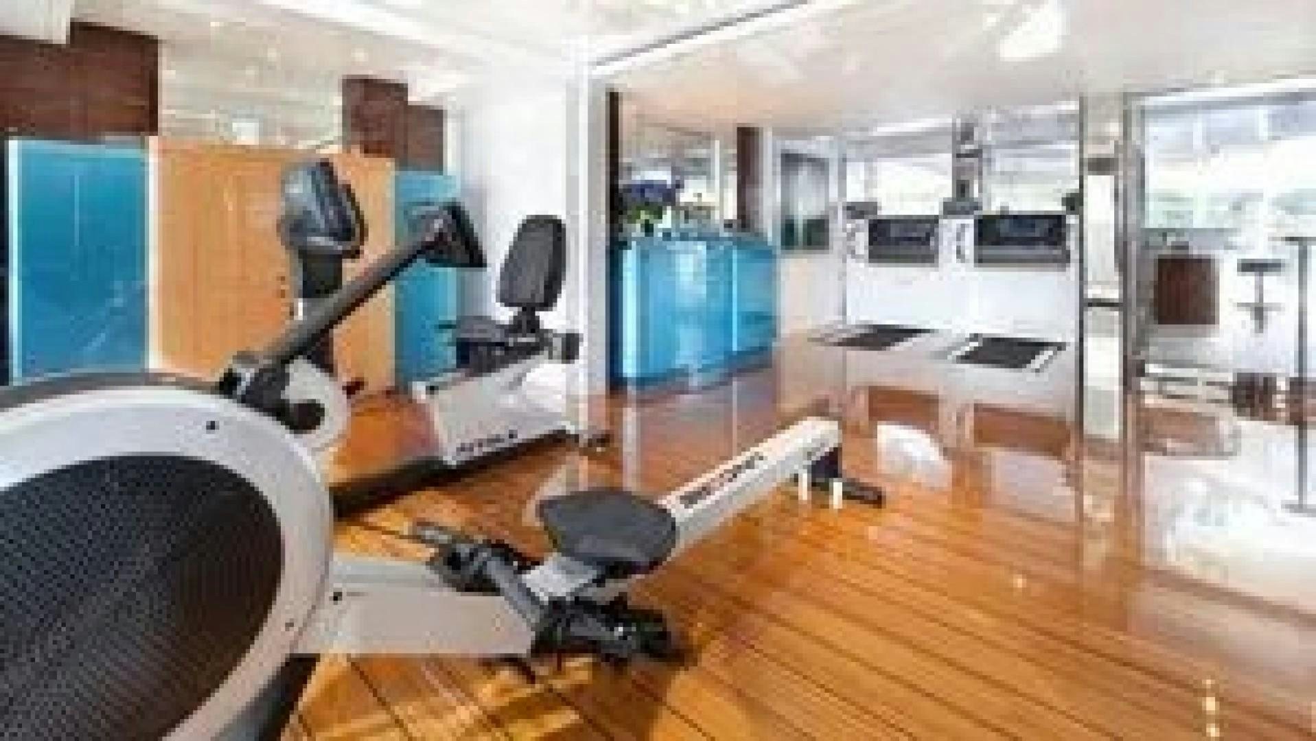 a room with a large machine aboard SYCARA V Yacht for Charter