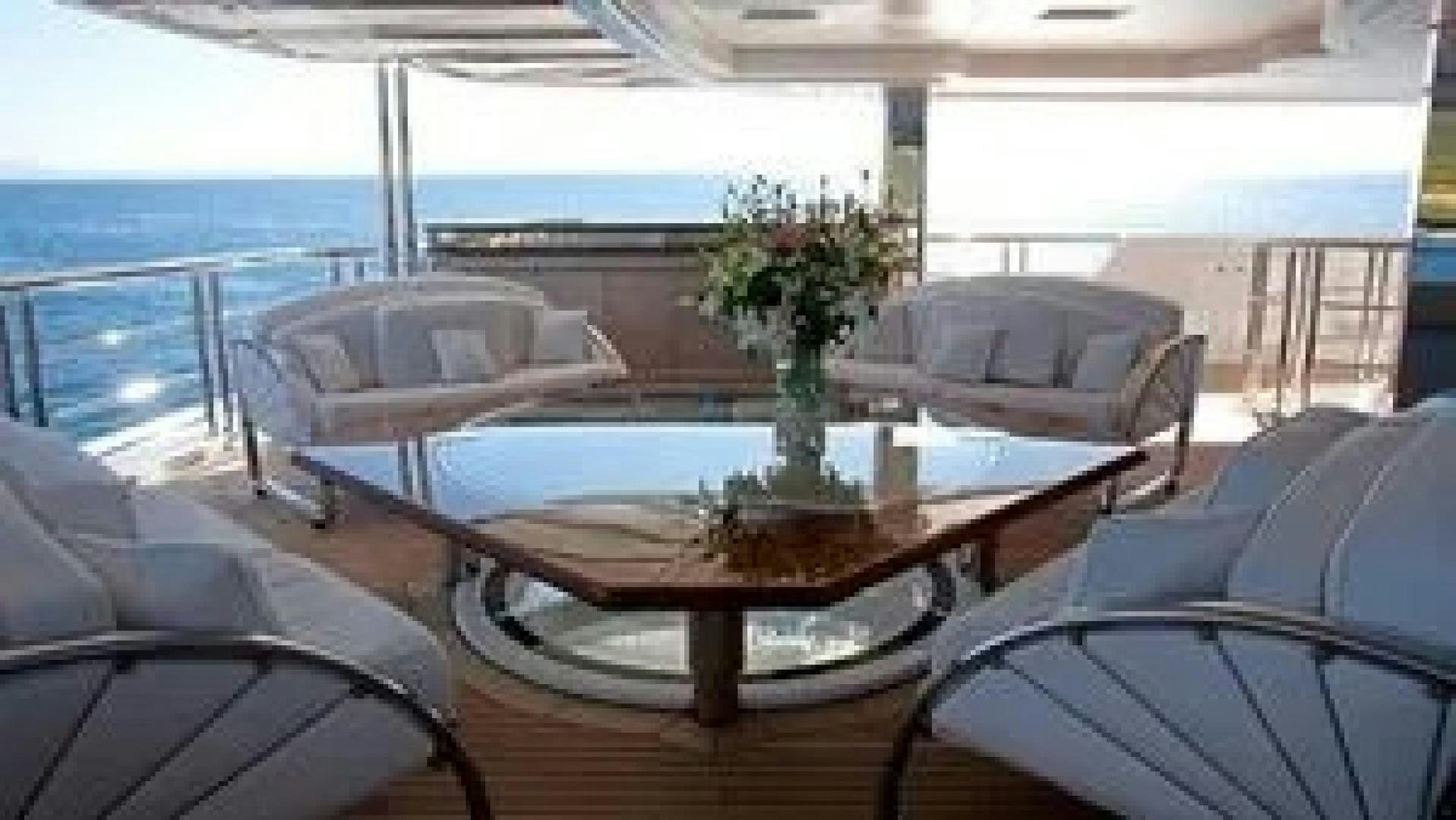 a table on a deck aboard SYCARA V Yacht for Charter