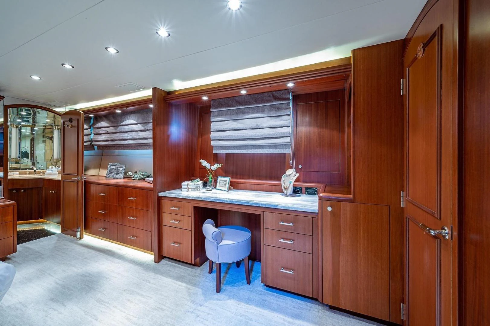 a kitchen with wooden cabinets aboard MAGNUM RIDE Yacht for Charter