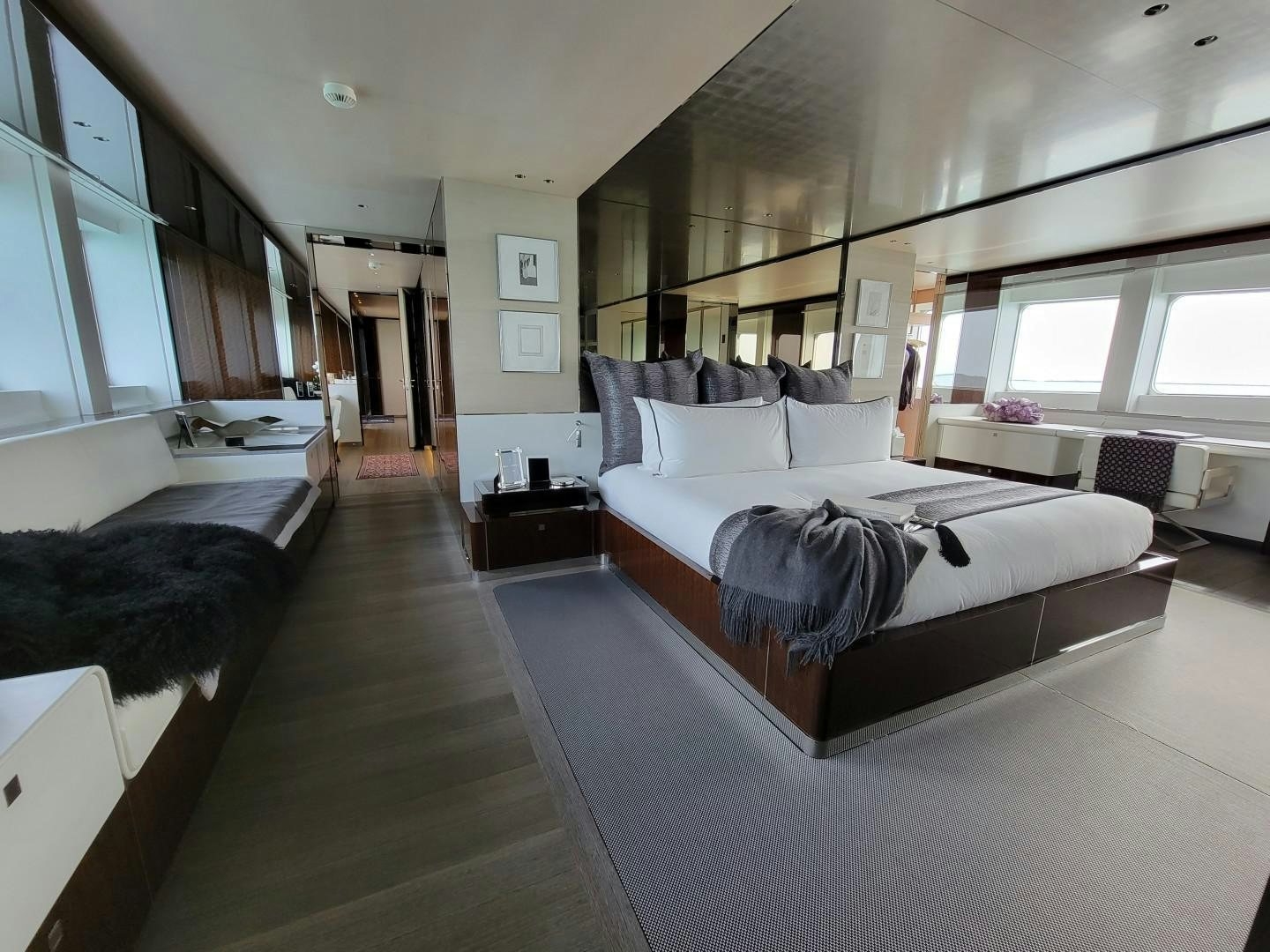 a room with a couple of beds aboard KNIGHT Yacht for Charter