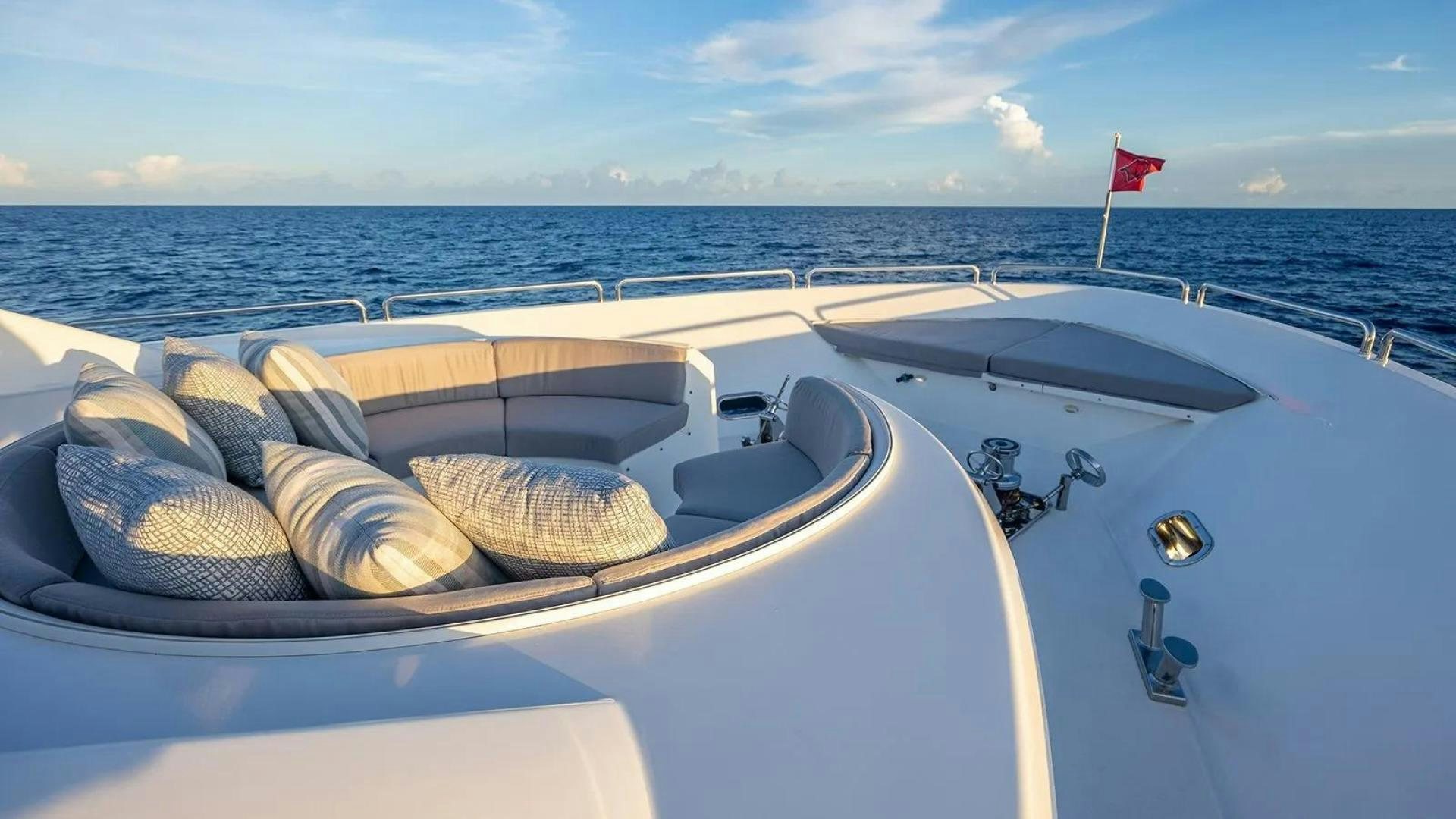 a boat with a hat on it aboard KEMOSABE Yacht for Charter
