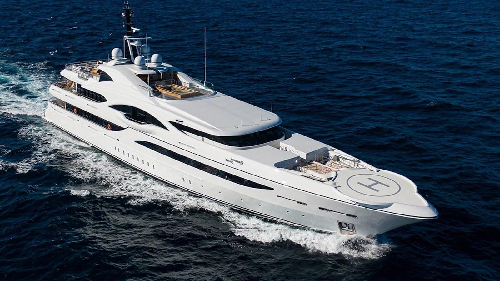 a white yacht in the water aboard QUANTUM OF SOLACE Yacht for Sale