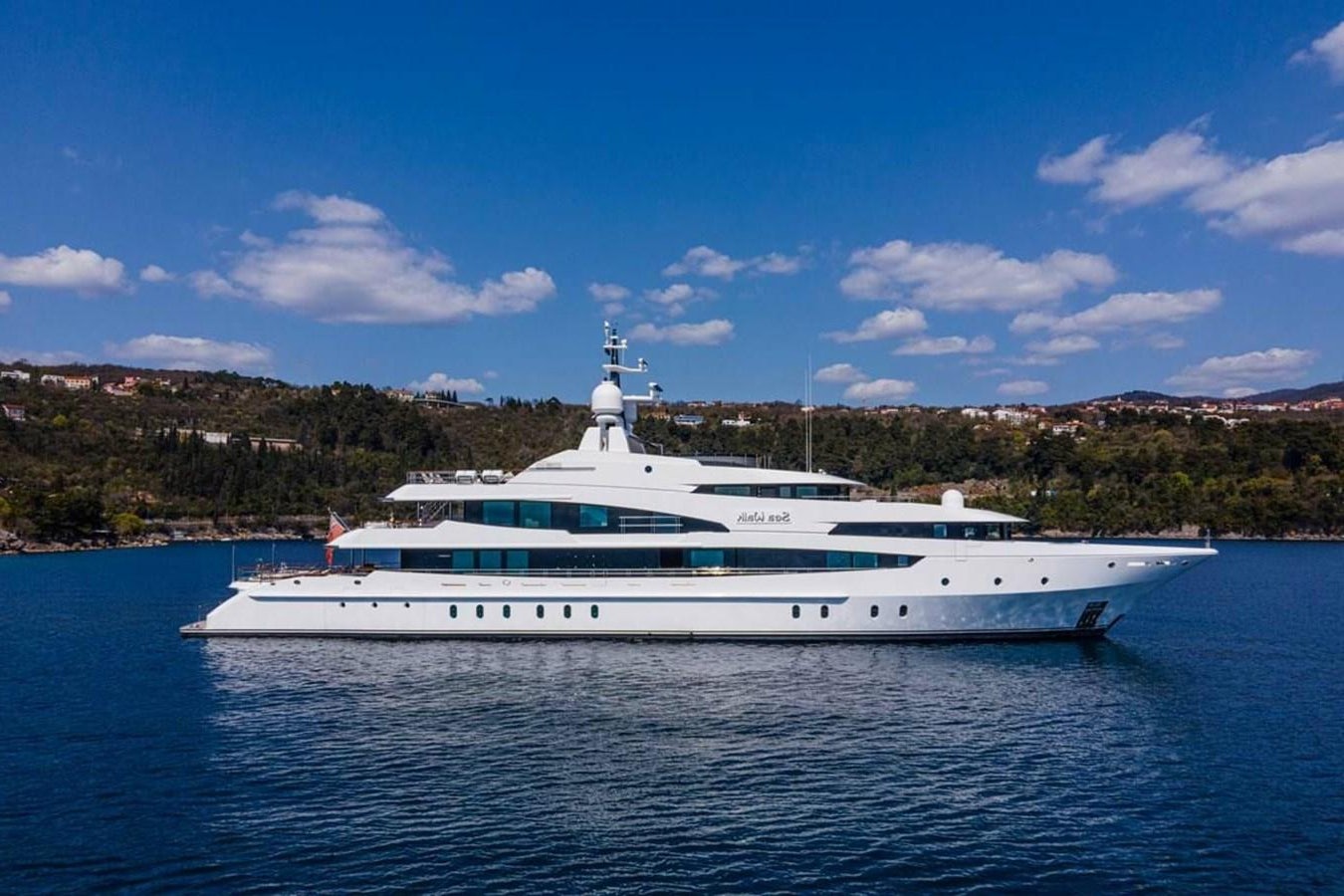 a white yacht on the water aboard LADY MAJA I Yacht for Sale