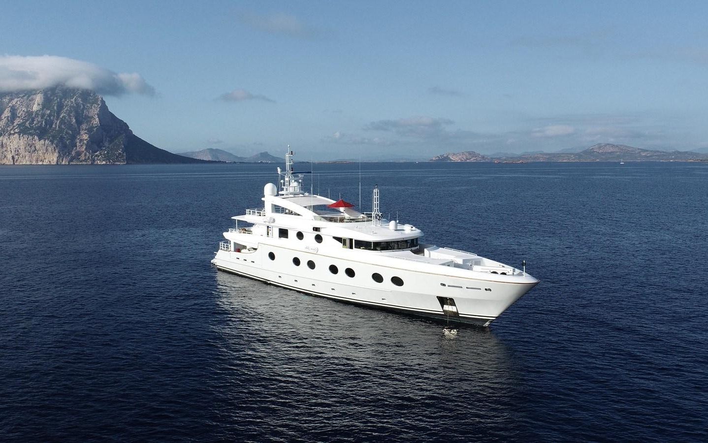 a white yacht in the water aboard QUEEN AIDA Yacht for Sale
