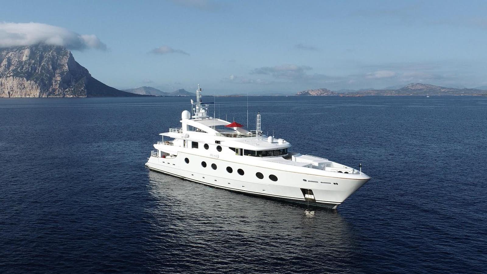 a white yacht in the water aboard QUEEN AIDA Yacht for Sale