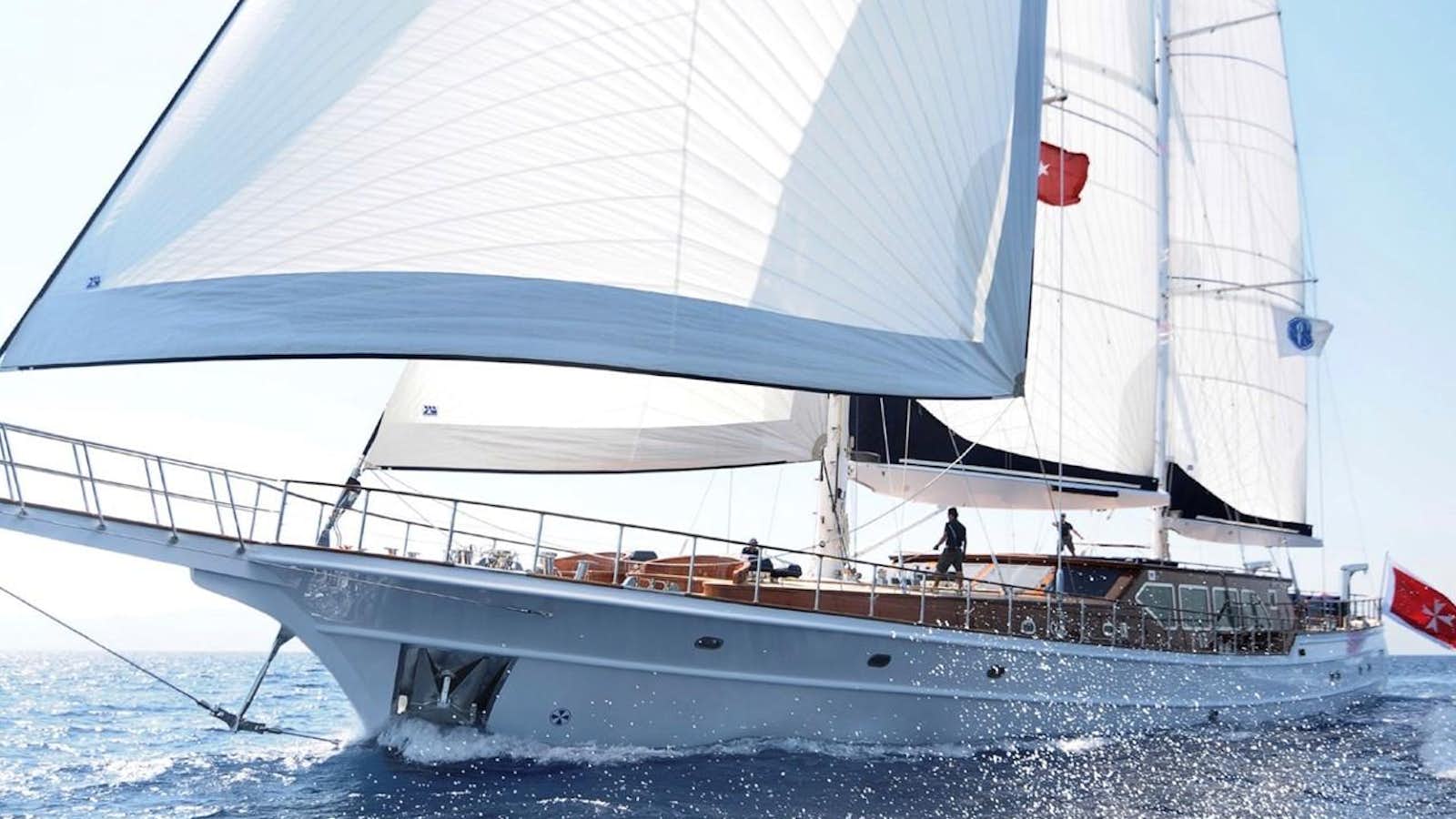 a large white boat with a white sail aboard CLEAR EYES Yacht for Sale