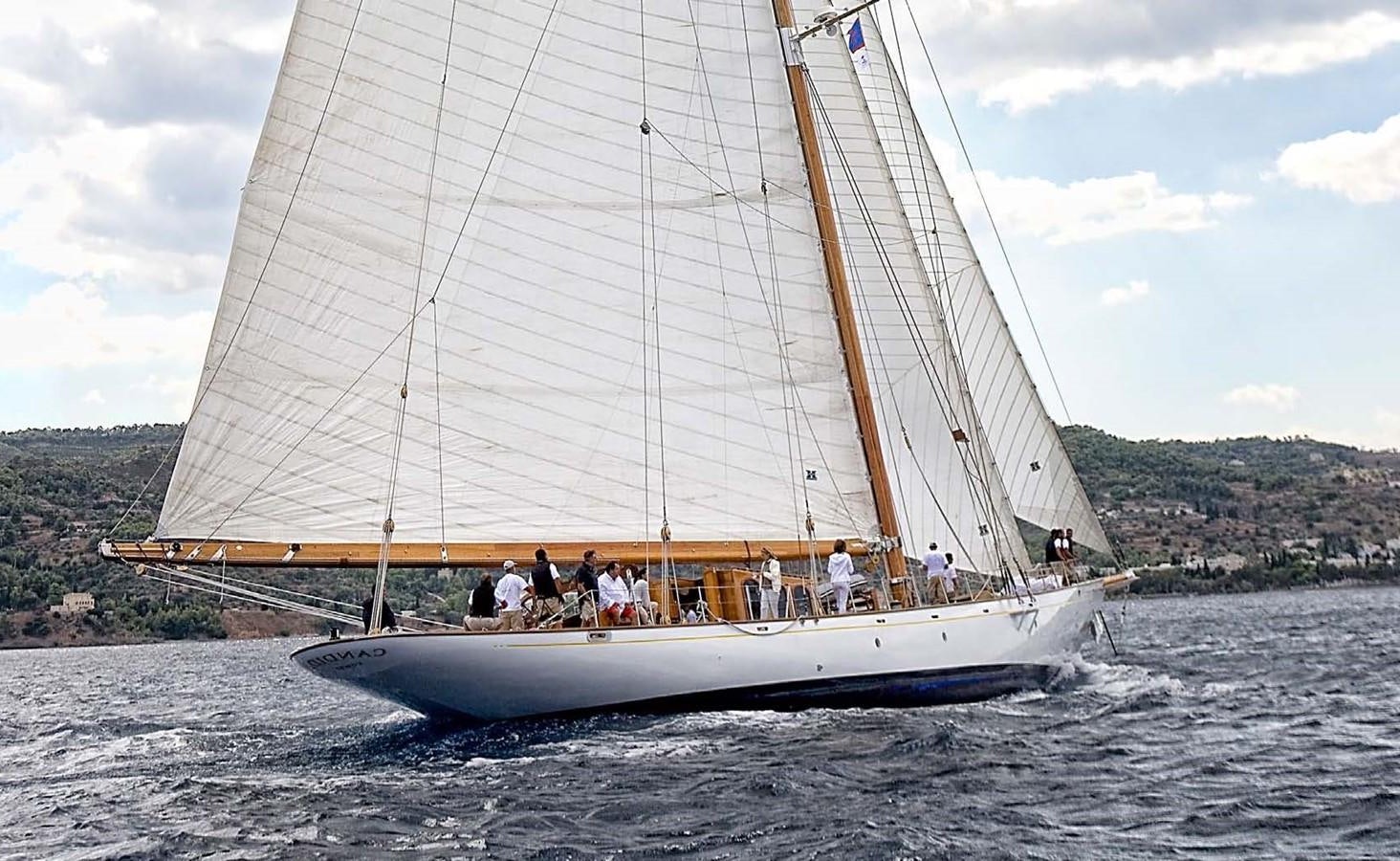 a sailboat with people on it aboard CANDIDA Yacht for Sale