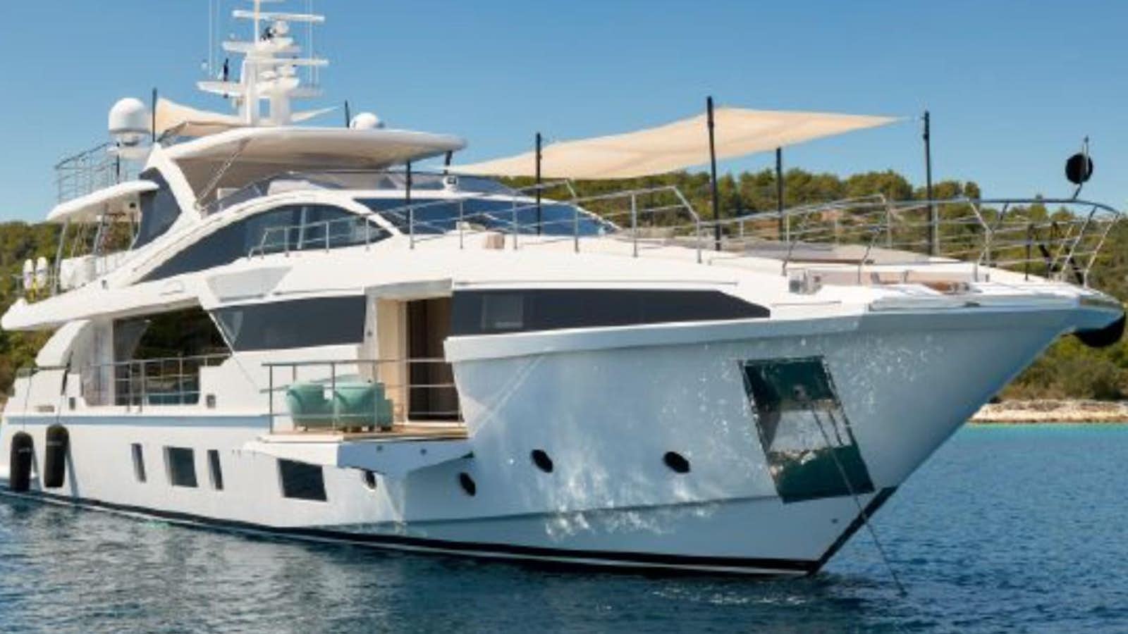 a white yacht on the water aboard 2019 AZIMUT GRANDE 35 METRI Yacht for Sale