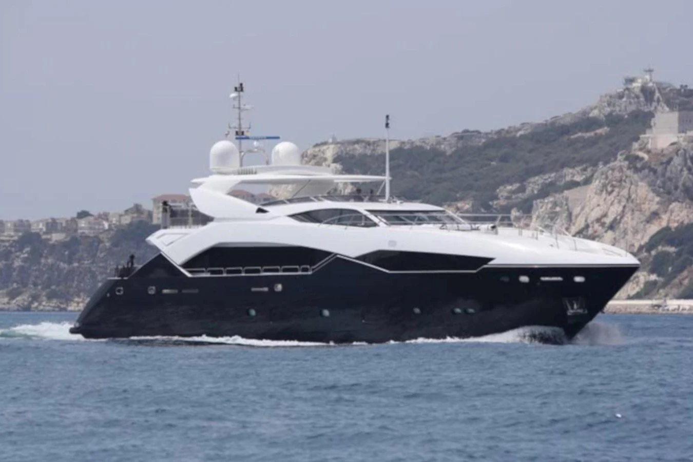 a large white yacht on the water aboard SUN FLOWER Yacht for Sale