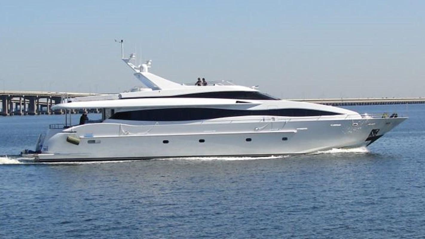a white yacht in the water aboard IDLETYME II Yacht for Sale