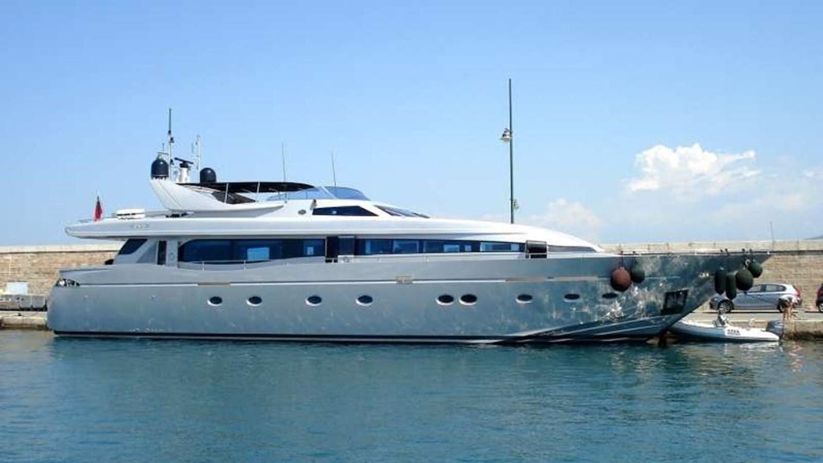a large white boat in a body of water aboard NAUGHTY BY NATURE Yacht for Sale
