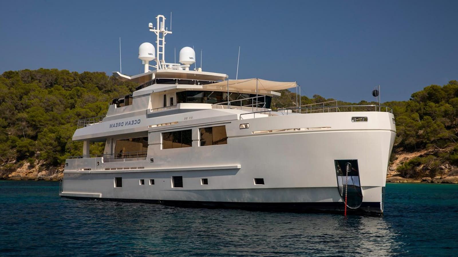 a large white boat in the water aboard OCEAN DREAM Yacht for Sale