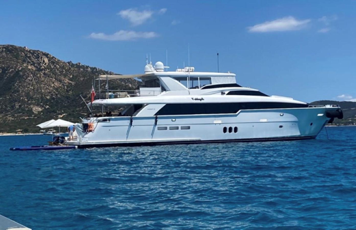 a white yacht in the water aboard MAGALITA V Yacht for Sale