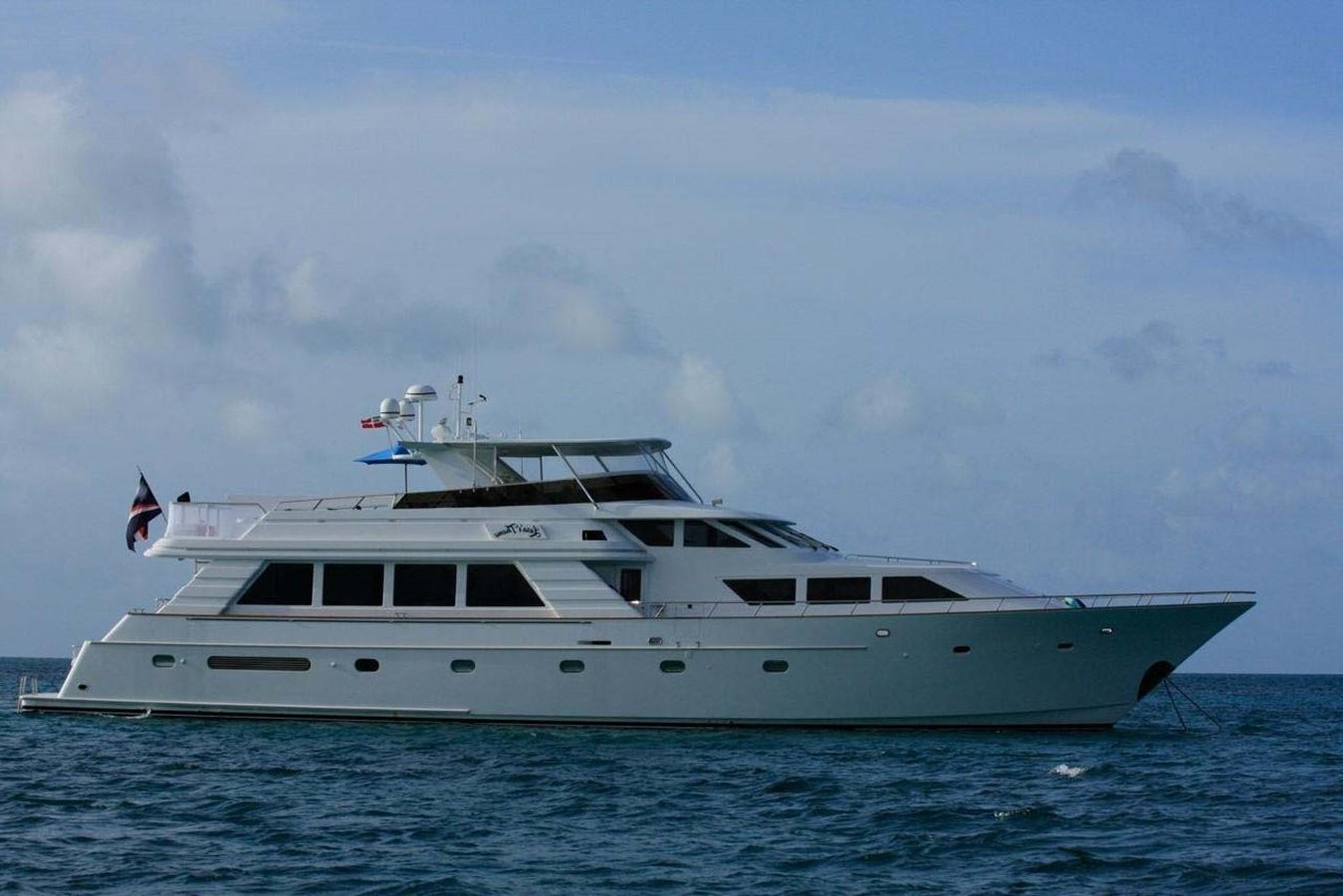 a large white boat in the water aboard DELITE Yacht for Sale