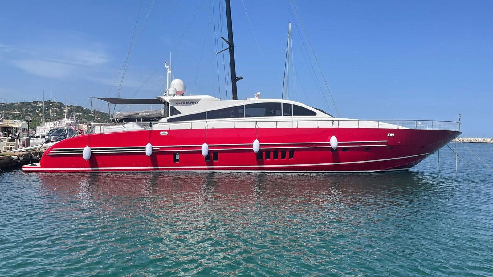 a red and white boat in the water aboard MYSVEN Yacht for Sale