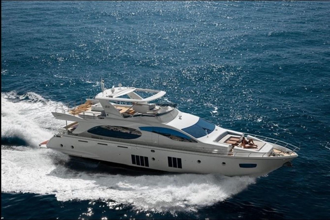 a white yacht on the water aboard AZ 88 Yacht for Sale