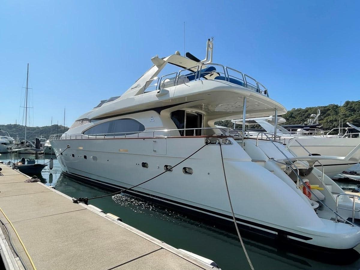 a white boat docked aboard AZIMUT 85 ULTIMATE Yacht for Sale