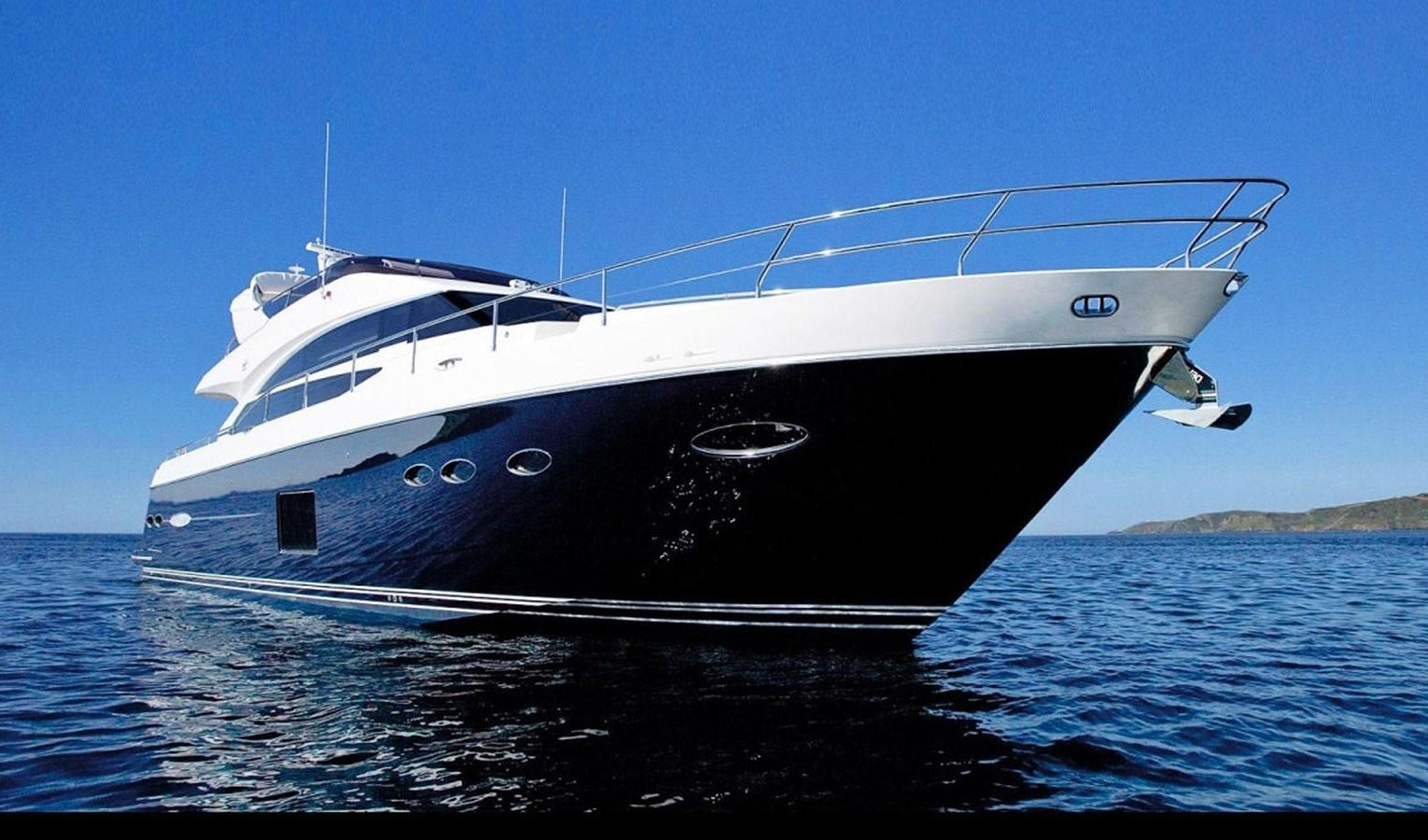 a white yacht in the water aboard DREAM ON Yacht for Sale