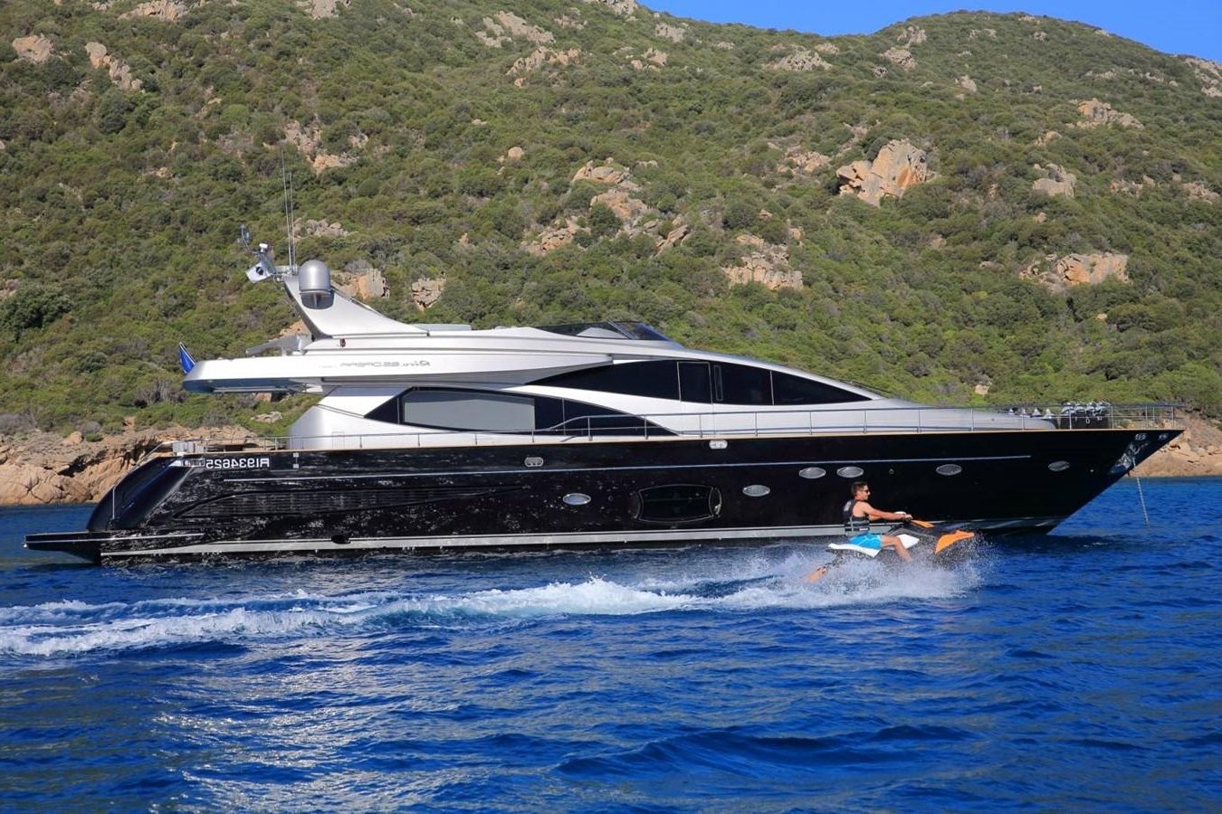 a person on a boat in the water aboard BLACK PEARL Yacht for Sale