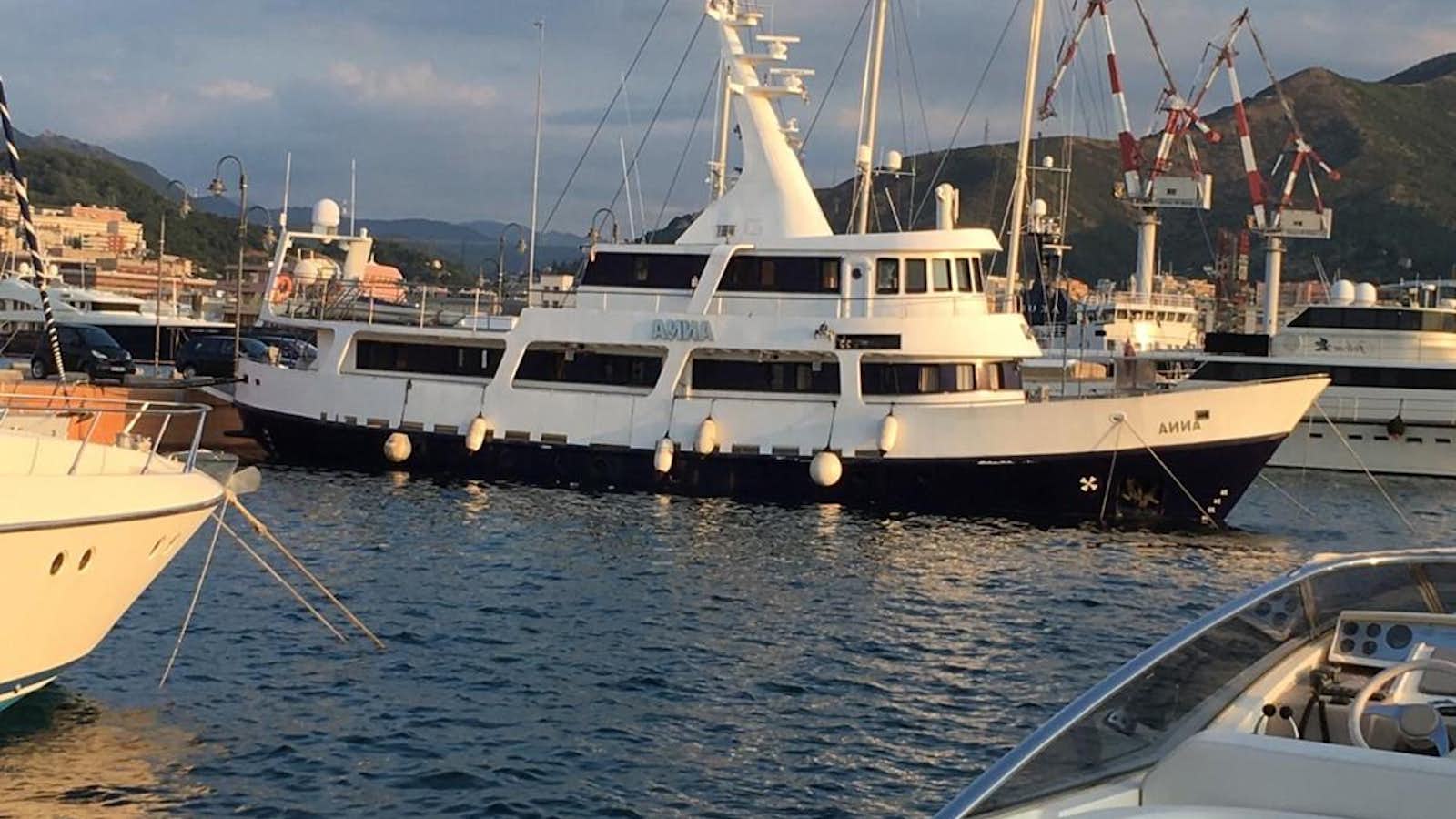 boats are parked in the water aboard ANNA I Yacht for Sale