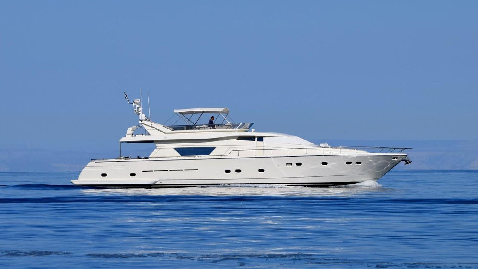a white yacht in the water aboard SANTA MARIA III Yacht for Sale