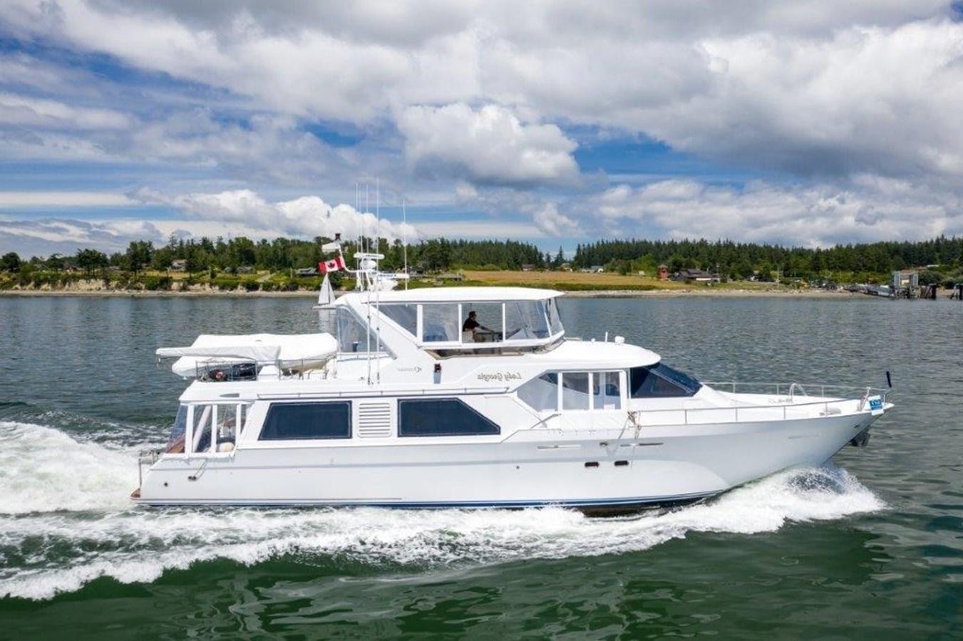 a white boat on water aboard LADY GEORGIA Yacht for Sale