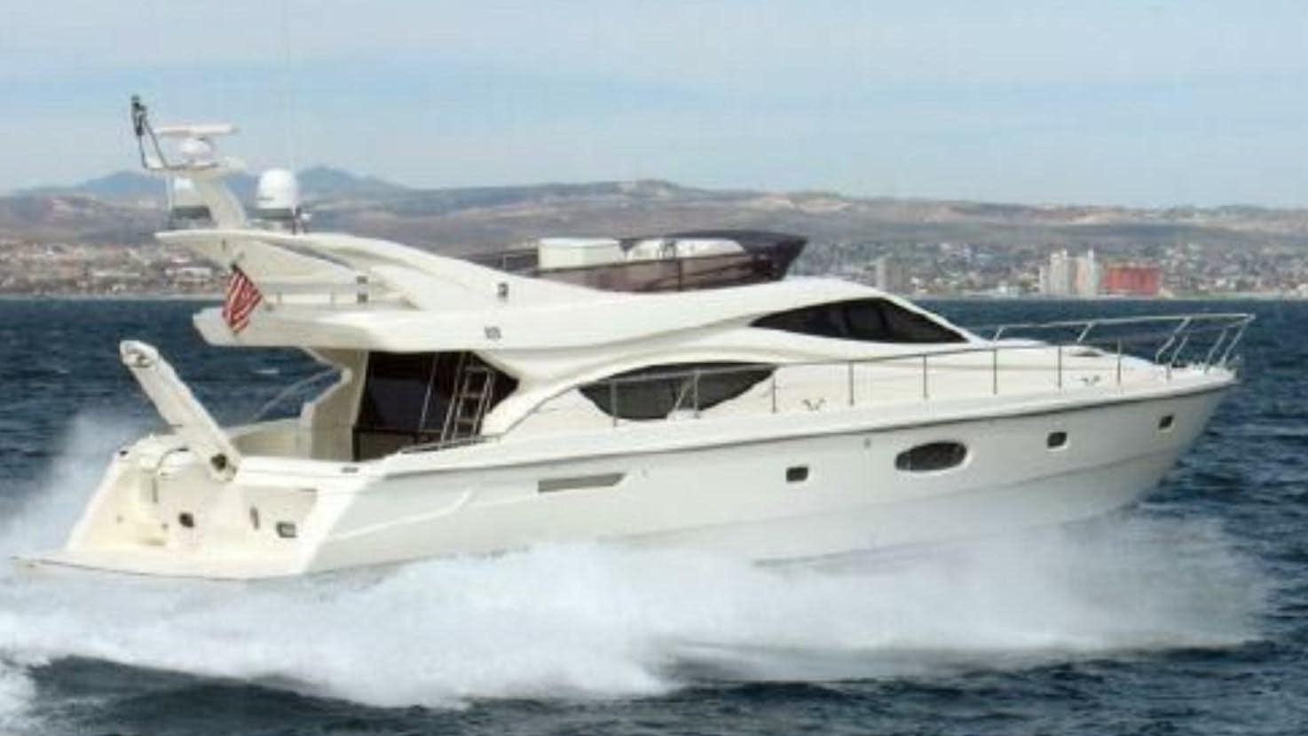 a white yacht in the water aboard 2006 FERRETTI  550 Yacht for Sale