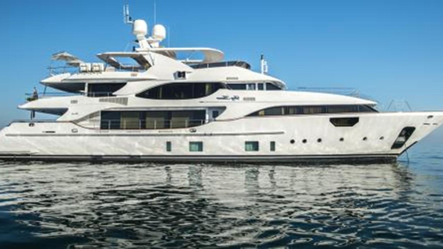 a large white yacht aboard SOY AMOR Yacht for Sale