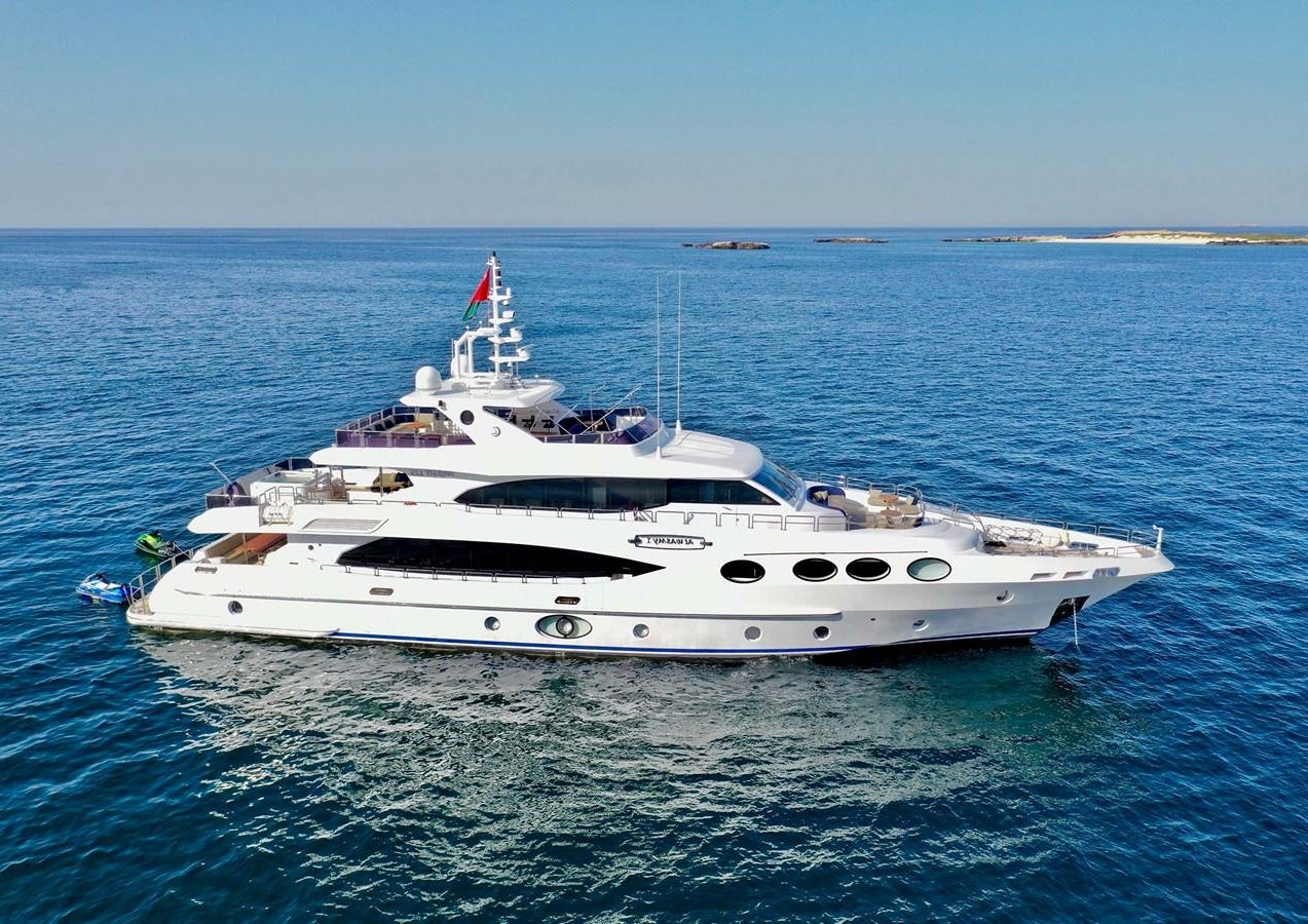 a white yacht in the water aboard AL WASMY I Yacht for Sale