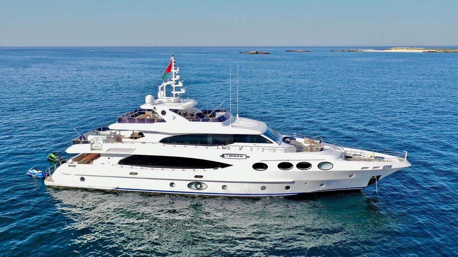 a white yacht in the water aboard AL WASMY I Yacht for Sale