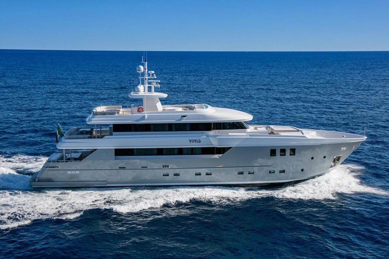 a white yacht on the water aboard OTAM SD35 Yacht for Sale