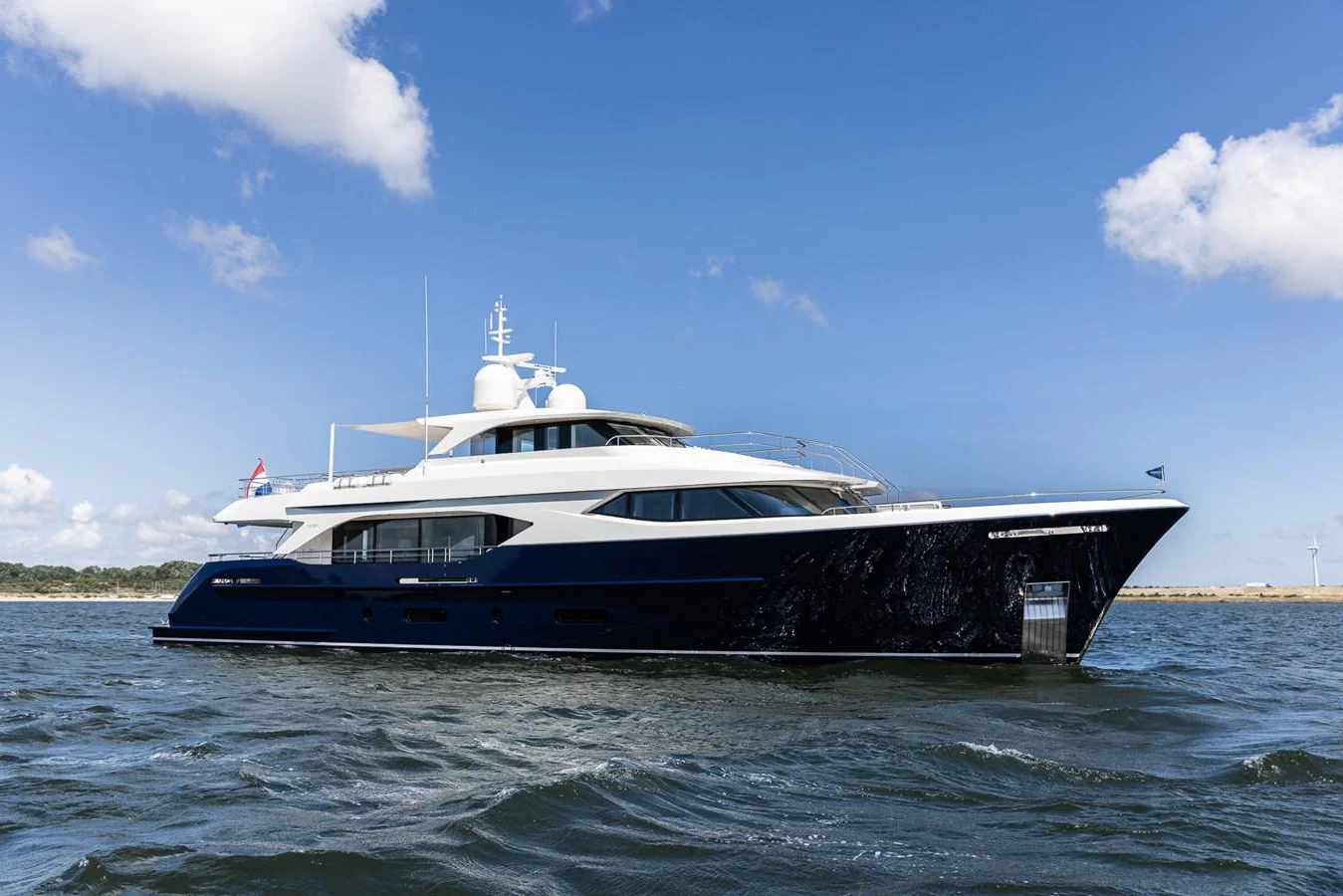 a boat in the water aboard MOONEN 110 MUSTIQUE Yacht for Sale