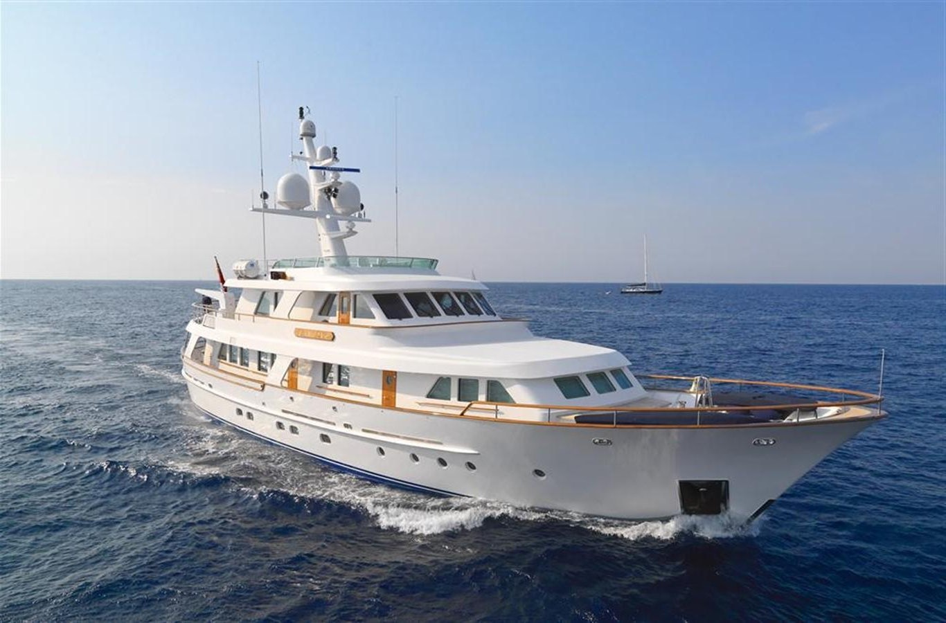 a white boat in the water aboard DONA AMELIA II Yacht for Sale
