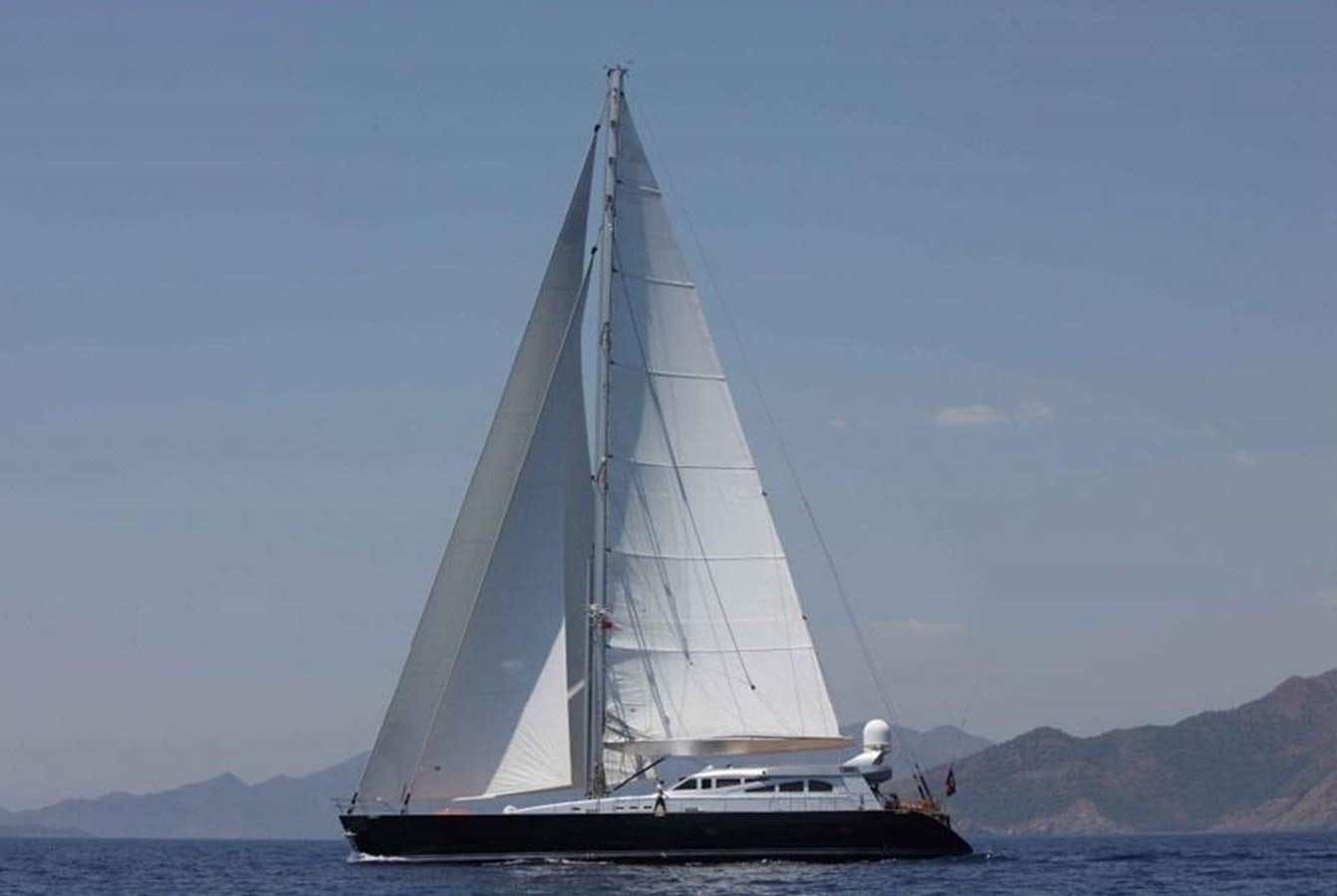 a sailboat on the water aboard OCEAN STAR Yacht for Sale
