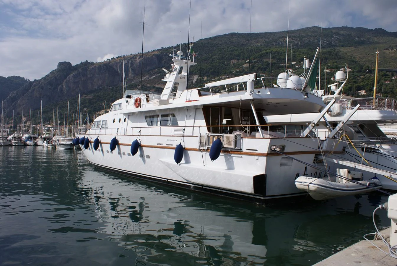 a couple of boats are parked in a harbor aboard LUC AN Yacht for Sale