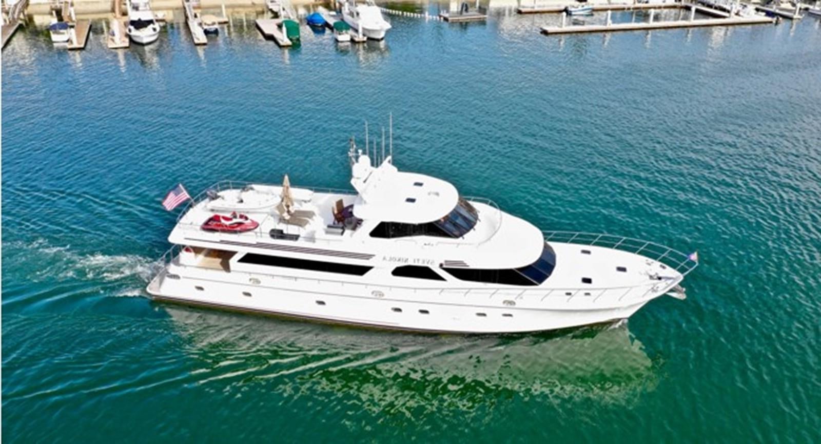 a white boat in the water aboard SVETI NIKOLA Yacht for Sale