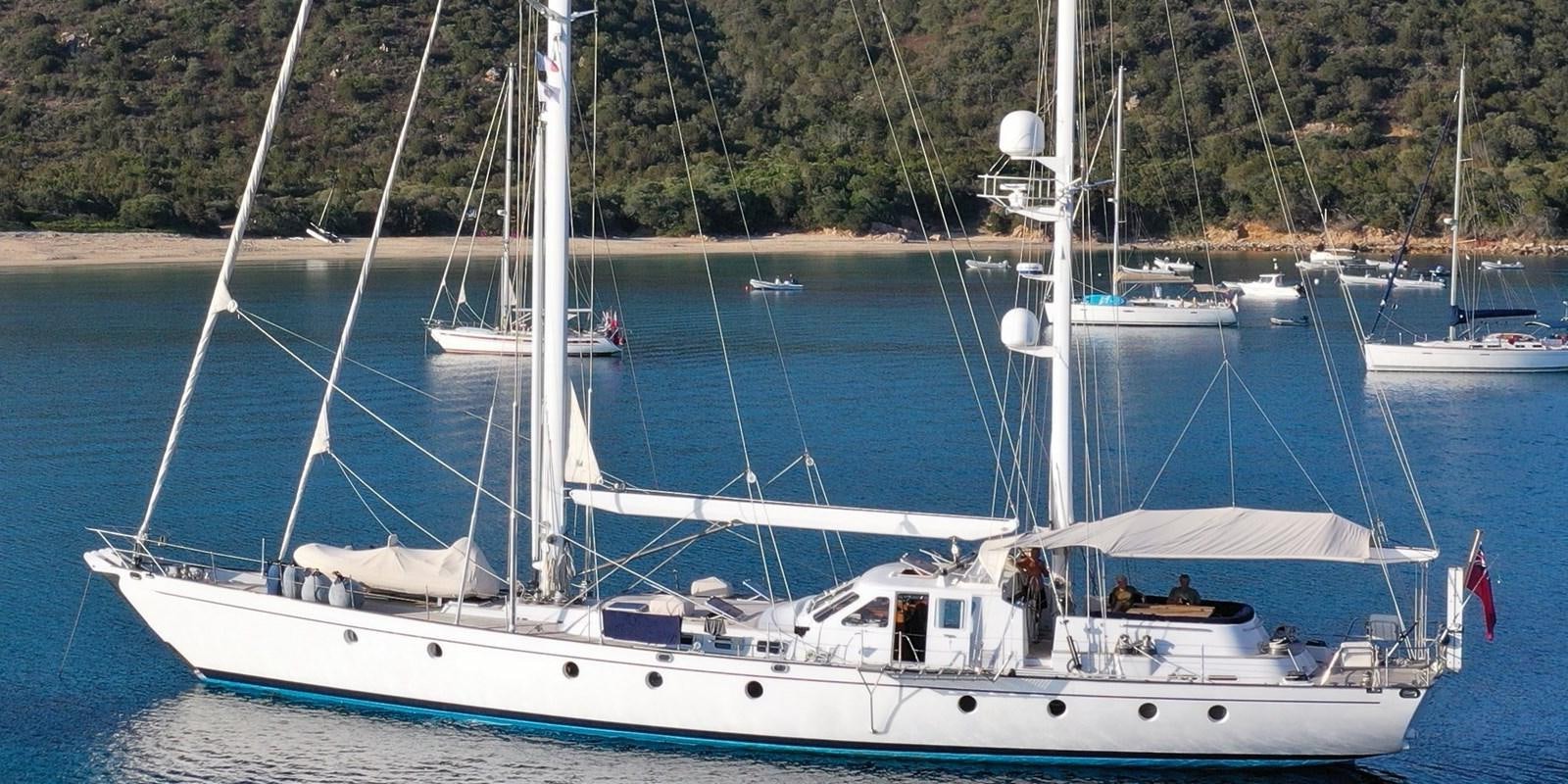 a boat with a sail on the water aboard ACOA Yacht for Sale