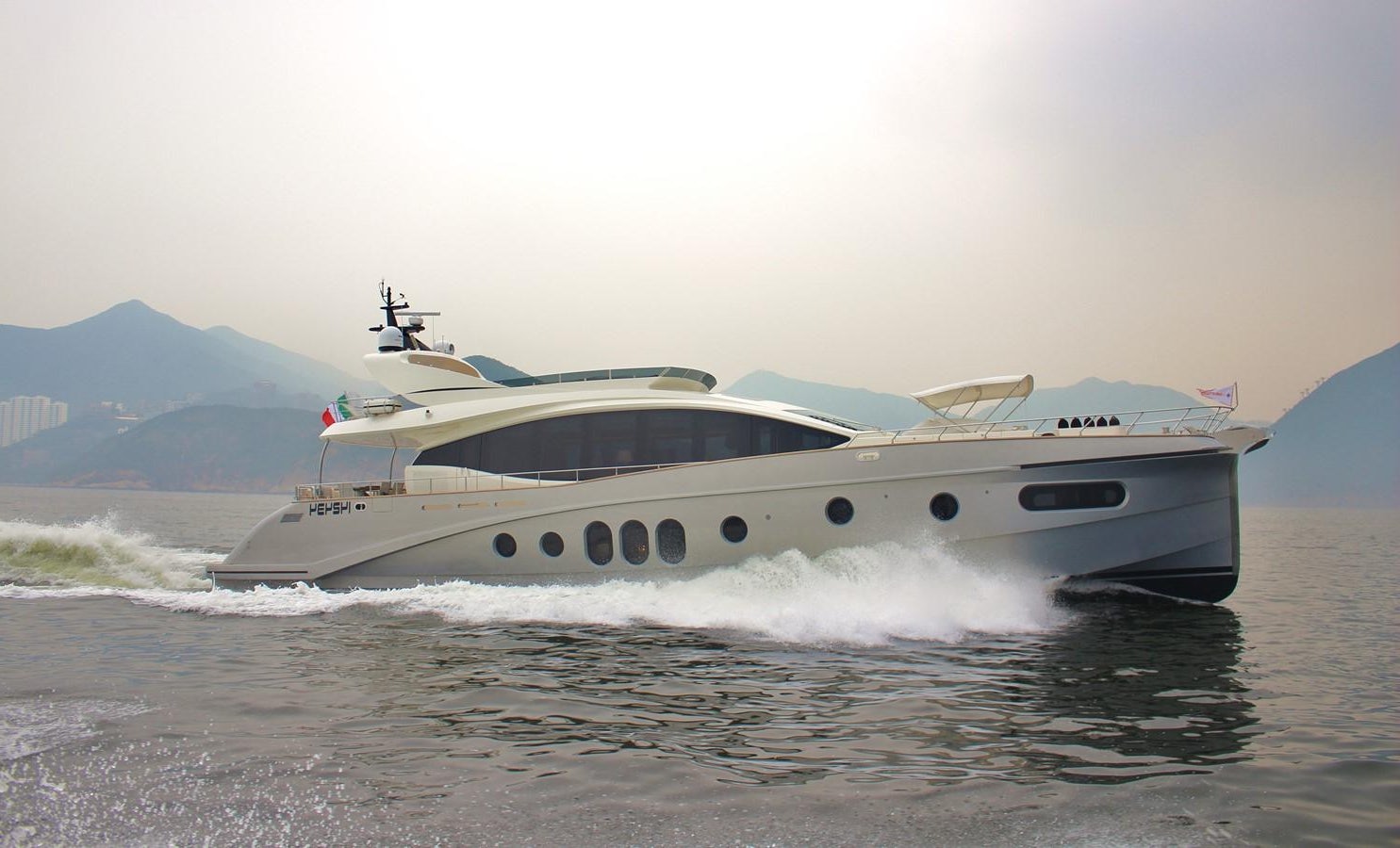 a boat splashing in the water aboard VERSILCRAFT V86 Yacht for Sale