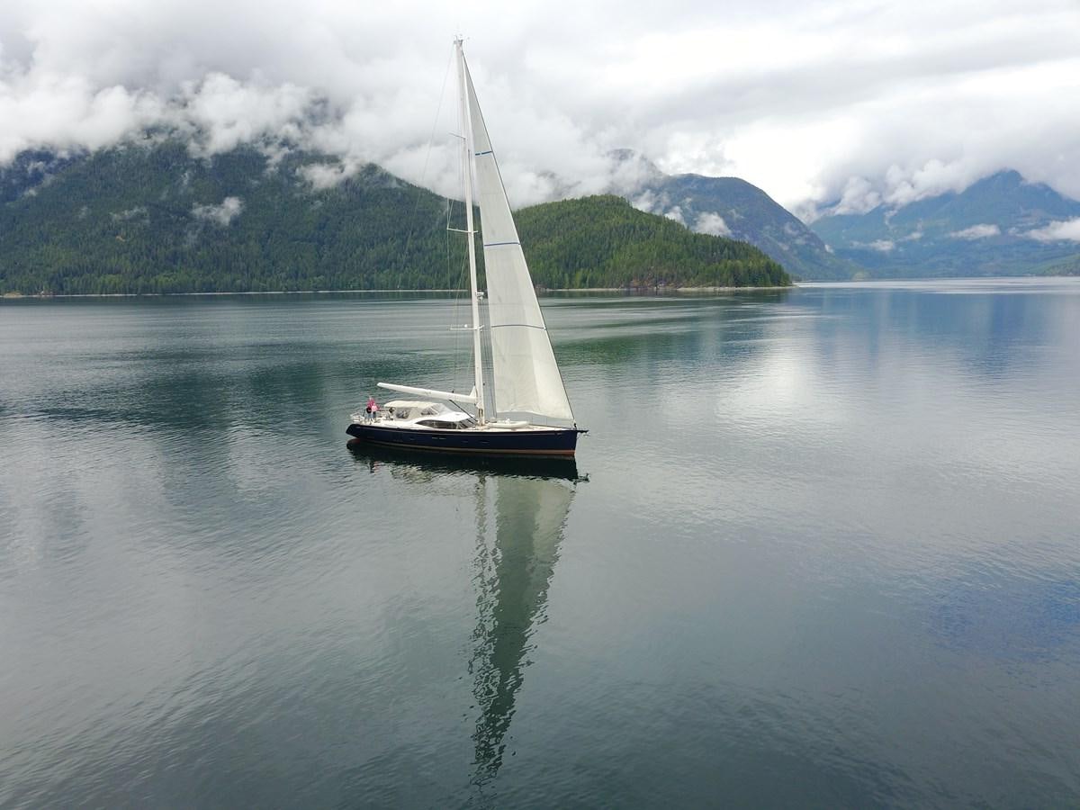 a sailboat on the water aboard AYNI Yacht for Sale