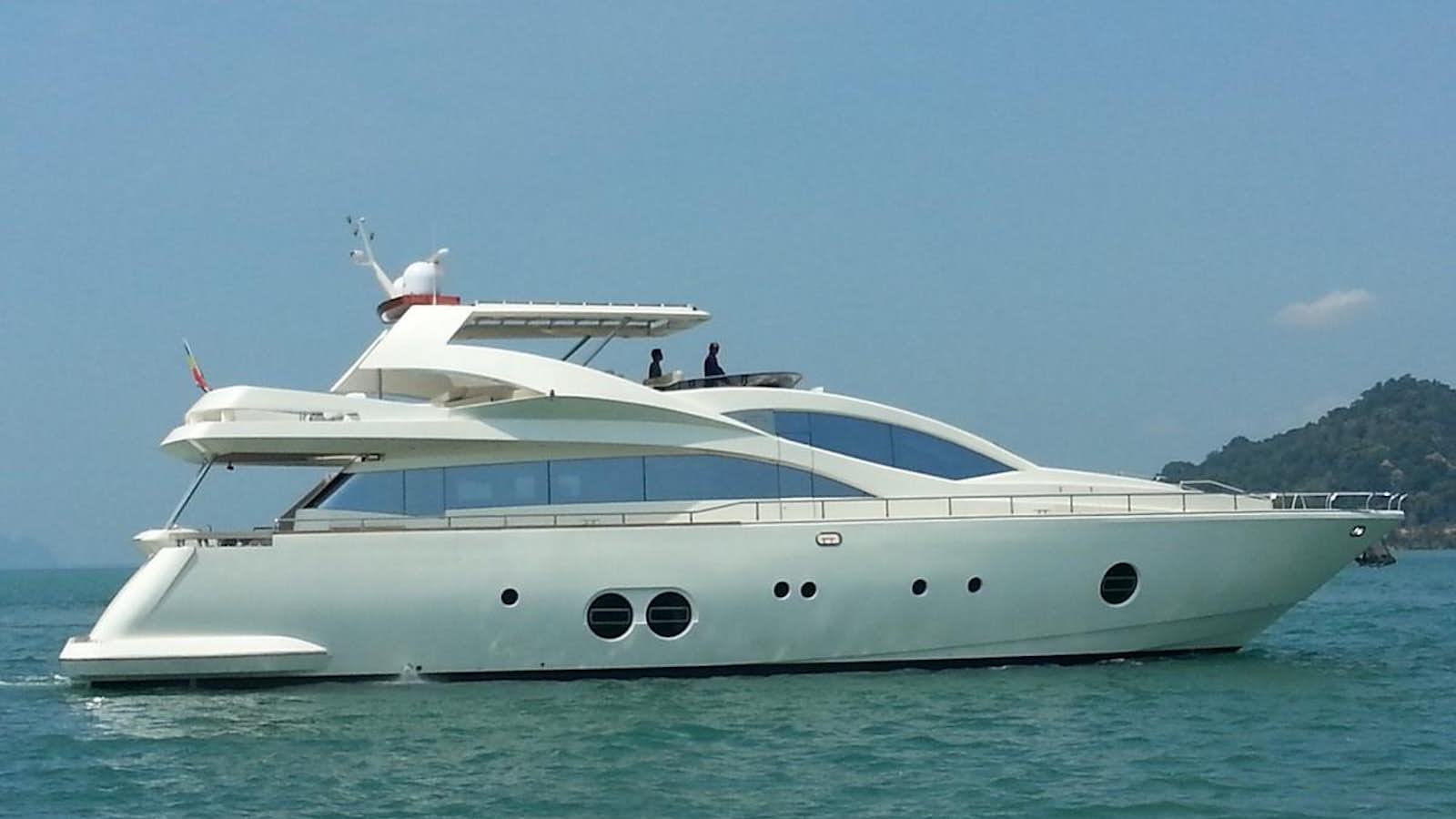 a white yacht in the water aboard MY JAYA Yacht for Sale
