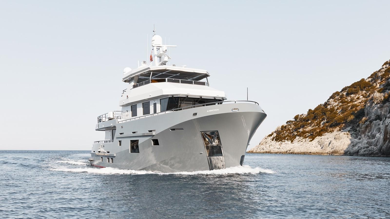 a white boat on the water aboard BERING 80/05 Yacht for Sale