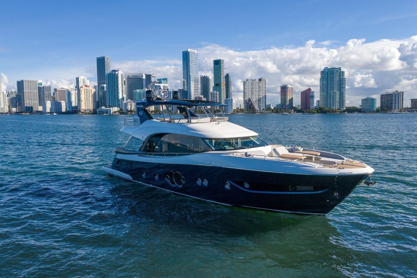 a boat on the water aboard MONTE CARLO YACHTS MCY 76 Yacht for Sale