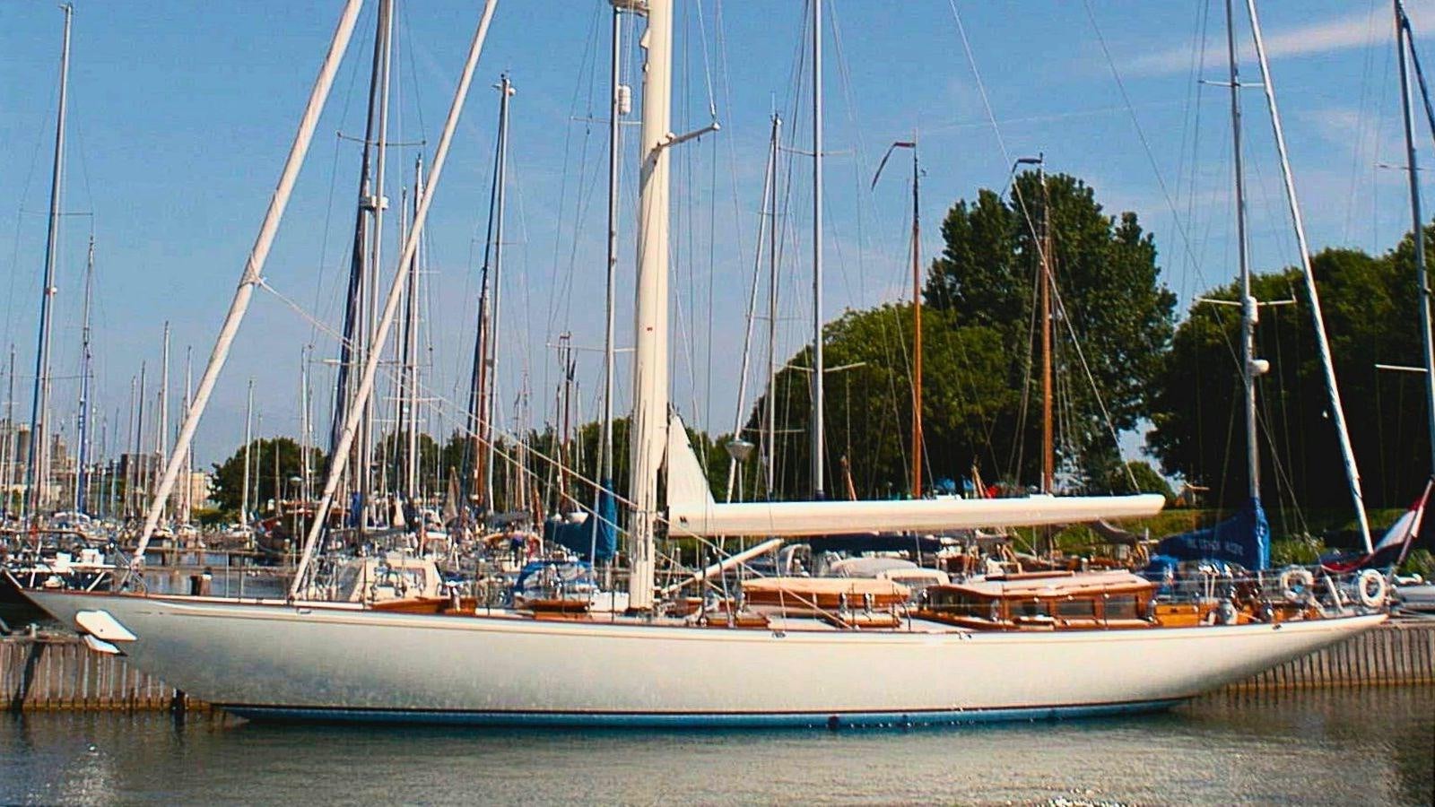 a boat docked at a pier aboard HOEK CLASSIC 73 DIXBAY Yacht for Sale