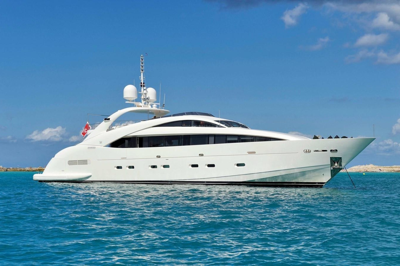 a white yacht in the water aboard WHISPERING ANGEL Yacht for Sale