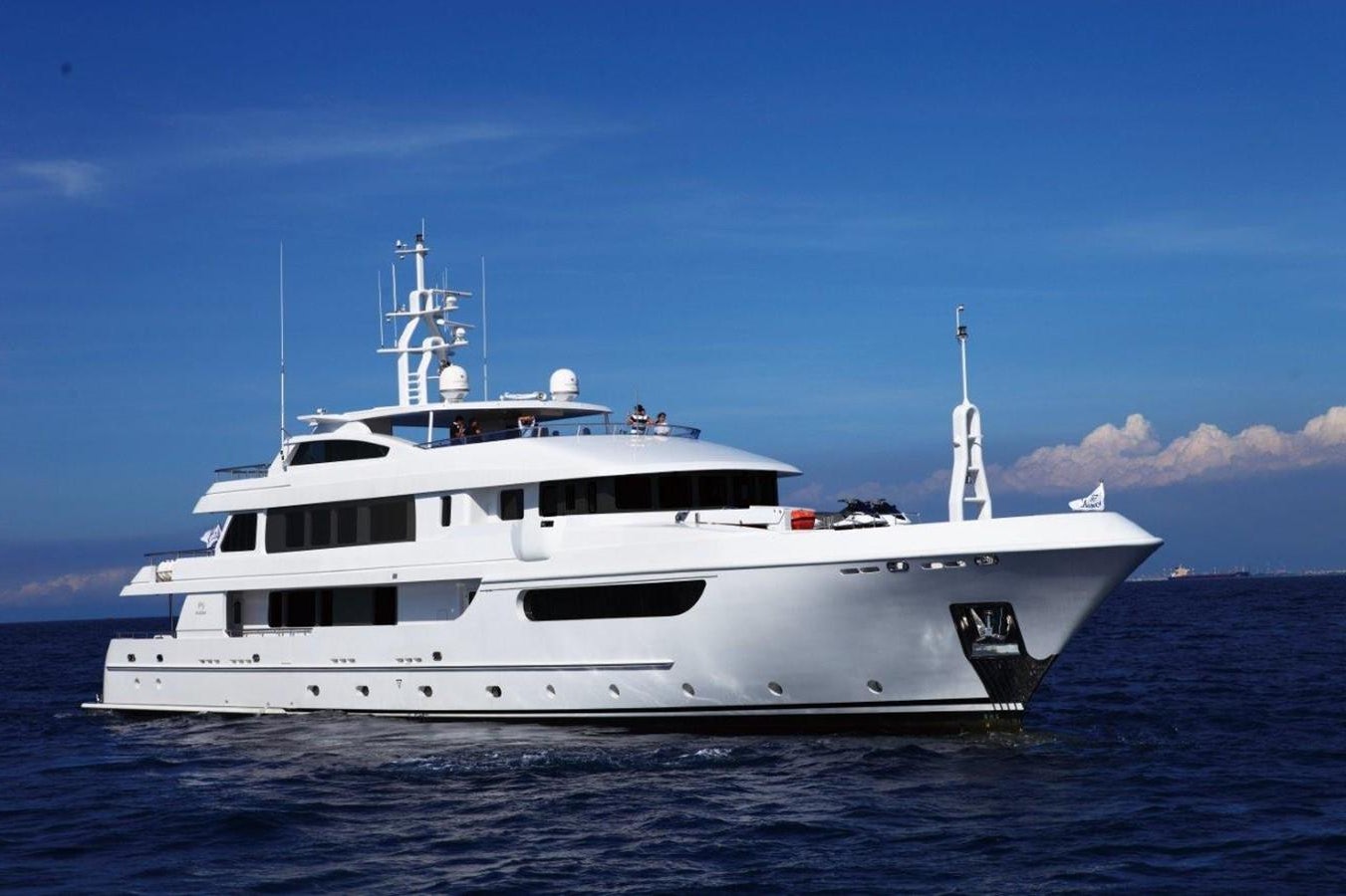 a white yacht in the water aboard EP150 Yacht for Sale